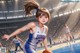 A girl in a blue and white uniform dribbling a basketball.